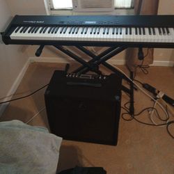 RD-100 Roland Stage Piano And Behringer Ultratone KXD12 -600w,12" Keyboard Amp And Pro line Keyboardstand ,3- Tier