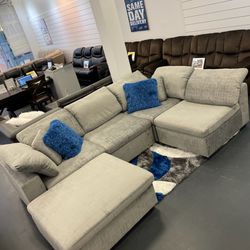 ONLY $899 LIMA SECTIONAL AND OTTOMAN SET 