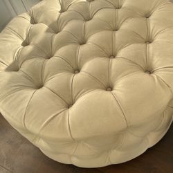 Fabulous white vinyl tufted ottoman
