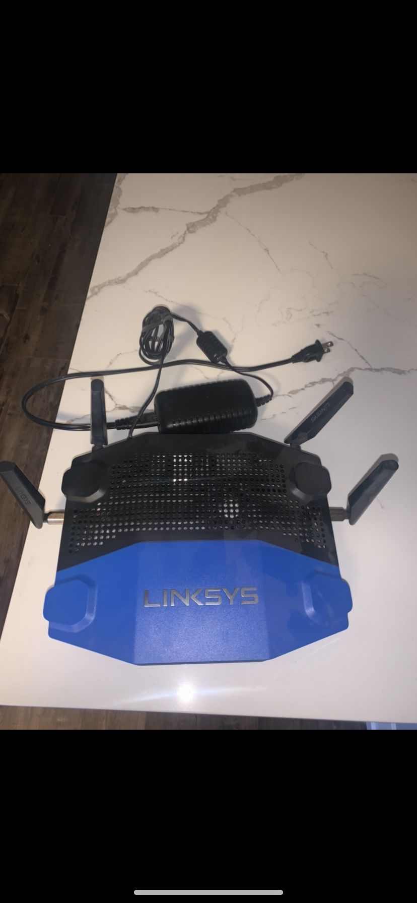 Linksys WRT 1900 AC WiFi router and Motorola Modem