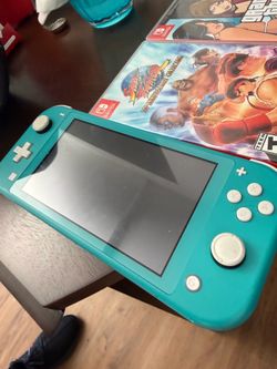Nintendo Switch Lite (LIKE NEW)
