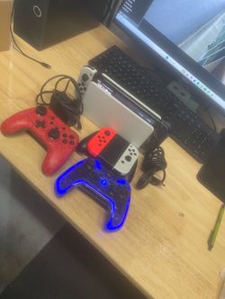 Nintendo Switch OLED with Controllers  and games Bundle