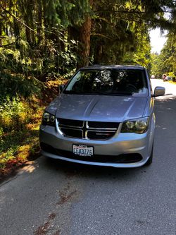 Dodge Grand Caravan silver minivan