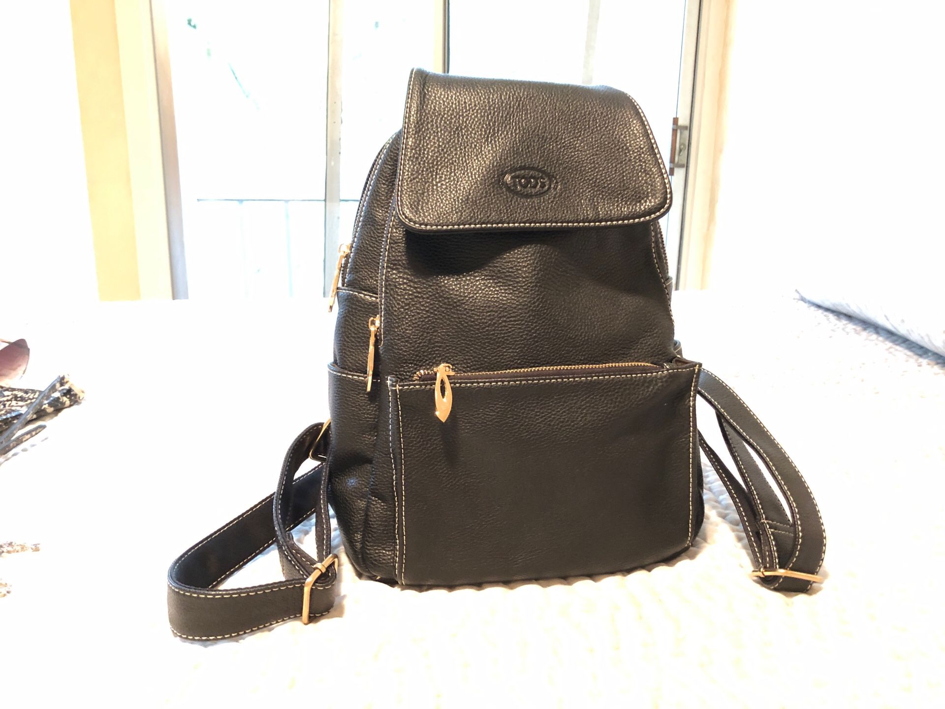 Tod’s Black Leather Backpack