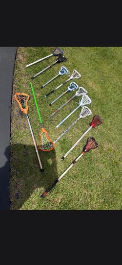 12 lacrosse  sticks.