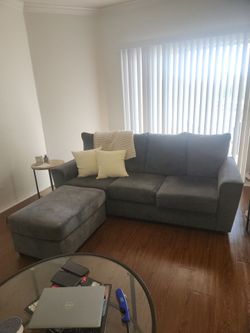 Ashley Sofa and Ottoman!!! 1 Year Old. Moving Sale!!!