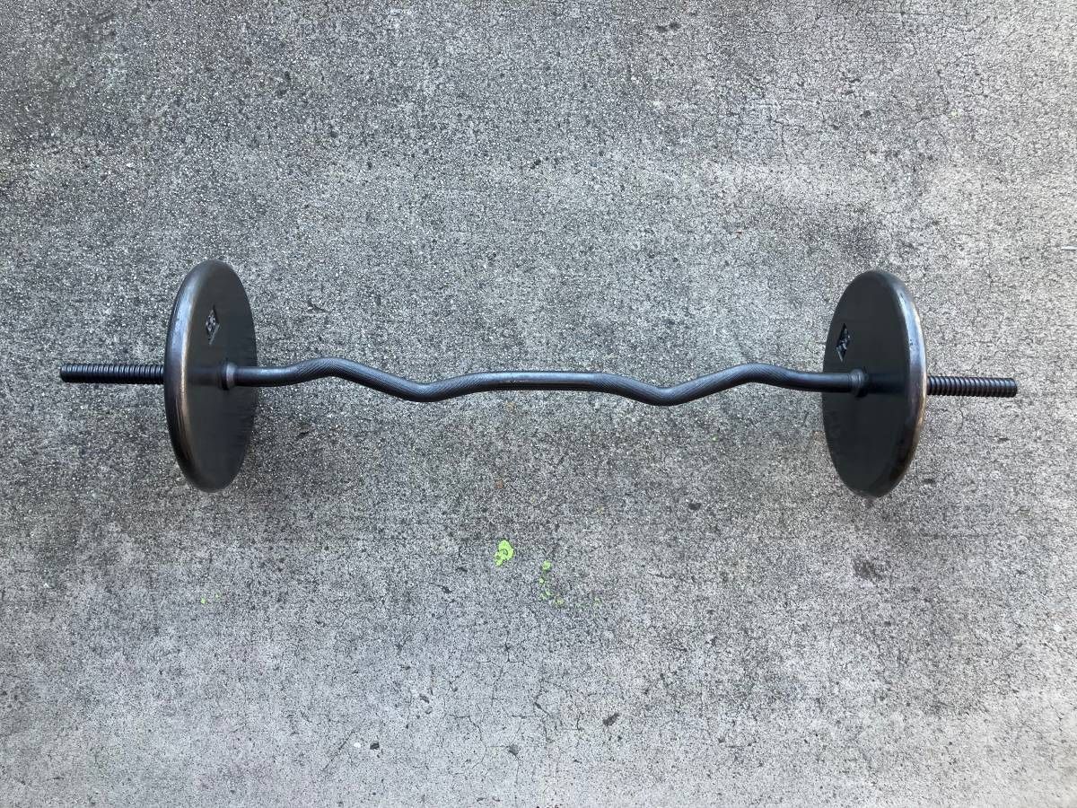 Weights curl bar with 50 lbs of weight plates