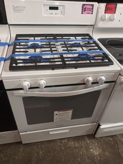 NEW scratch and dent Whirlpool gas stove.