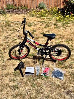 Kids Guardian 16” Ethos Bike with unused accessories like training wheels, extra seat, bell, red handlebar grips,