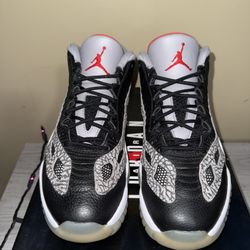Jordan 11 Low  “Black Cement IE”