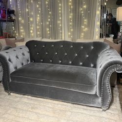 Gray Velvet Loveseat with Button Tufted Crystals And A Silver Nail Head Trim By Coaster Furniture