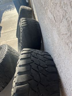 Four Tires Used And Universal Rims