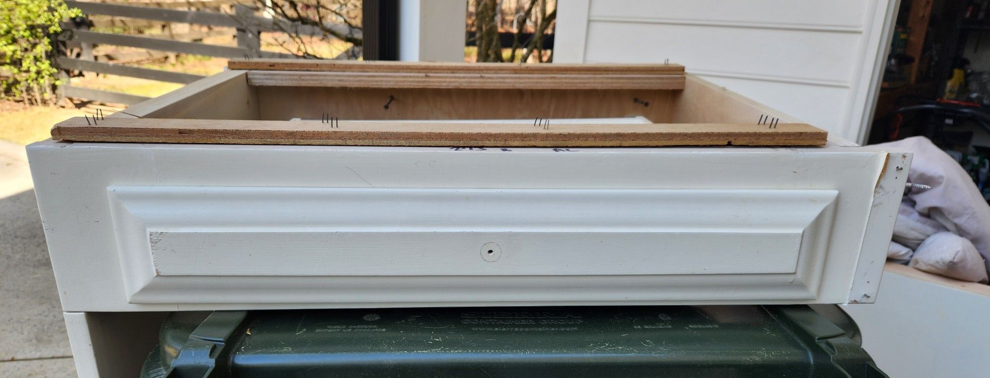 Wall mount side storage white drawer complete with tracks
Previously used as a desk in a kitchen. Solid thick Wood.
Measures 32" x 22" x 6".