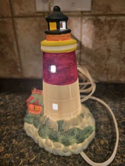 Porcelain electric light-up 9" lighthouse