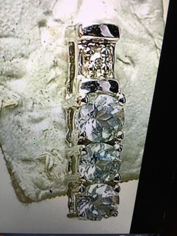 Vintage 10k white gold light blue topaz and 1 diamond ladies stick earrings