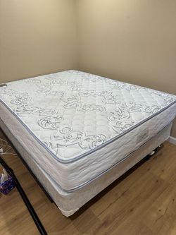 Queen mattress and a box spring