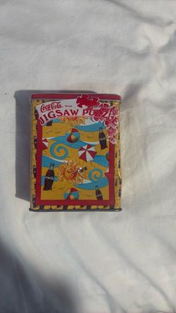 vintage Coca-Cola 75-piece travel jigsaw puzzle in a collectible beach theme tin