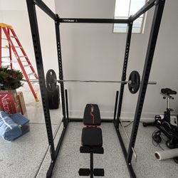 SQUAT RACK — 45lbs Weights X2–Barbell 45lb—-folded Bench
