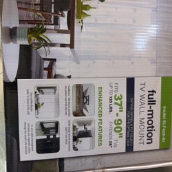 Full motion TV wall mount Fits 37” By 9” Inches