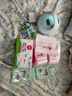 Spectra Breast Pump and breast feeding extras