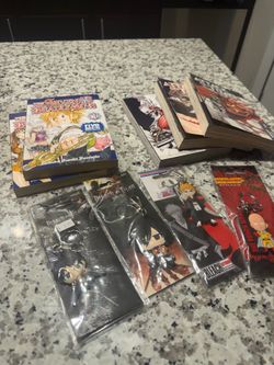 The seven deadly sins manga 1 and 2 and AOT manga 1-3 with anime key chains