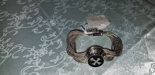 Silver bracelet with black cross