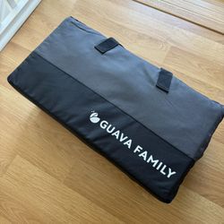 Guava lotus travel crib NEVER USED still sealed in it original package