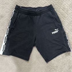 Men Puma black logo jogger shorts size M Black shorts featuring side pockets, elastic waistband with drawstring, back pocket, side logo graphic  fabri