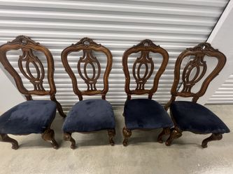 Navy blue and brown wooden chairs
