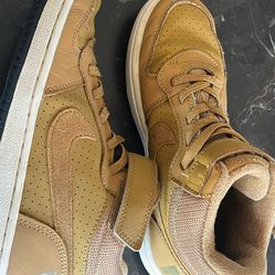 Gold Nikes size 1.5Y
