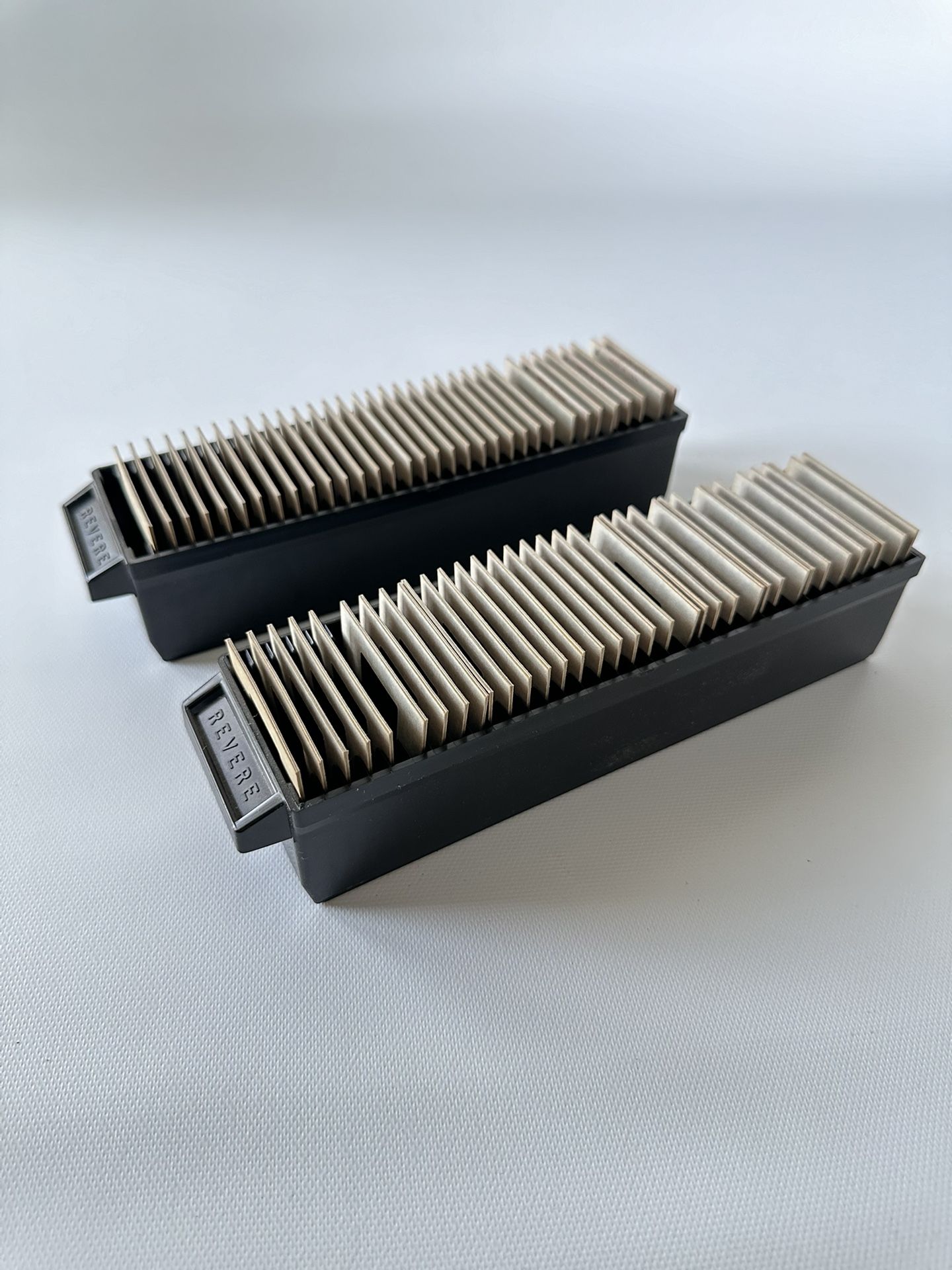 Photos With trays used to hold and feed slides into a compatible projector