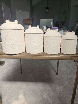 4 canister set of Ceramics that need You