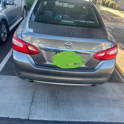 2017 S Nissan Ultima four-door sedan