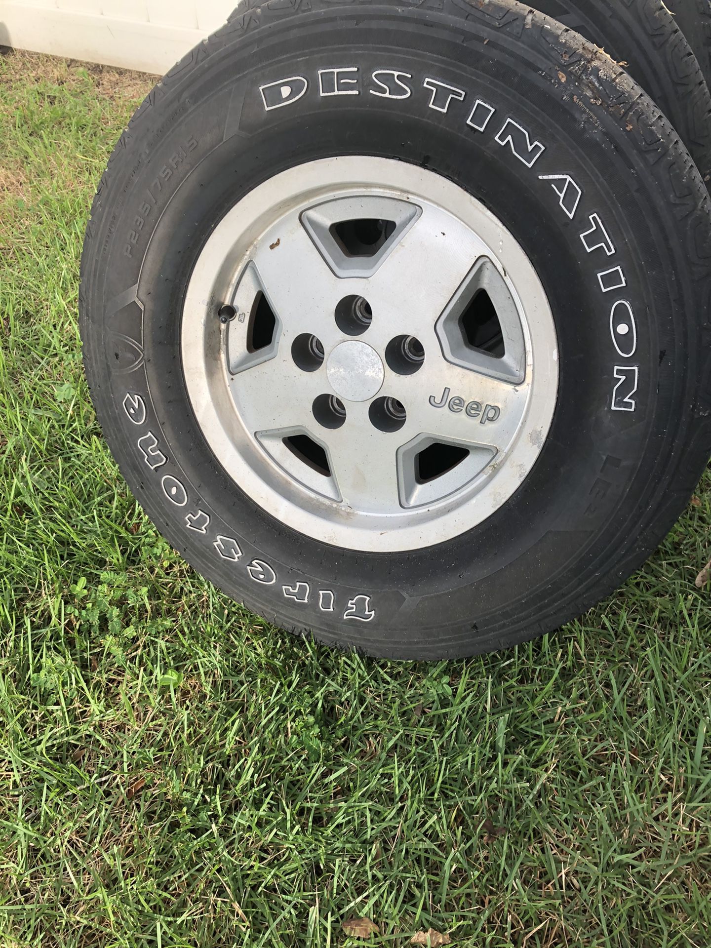5x4.5 15” stock Jeep wheels & tires $50 OBO