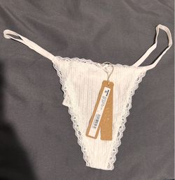 SKIMS lightweight pointelle lace string thong. Color snow/white. Size medium.