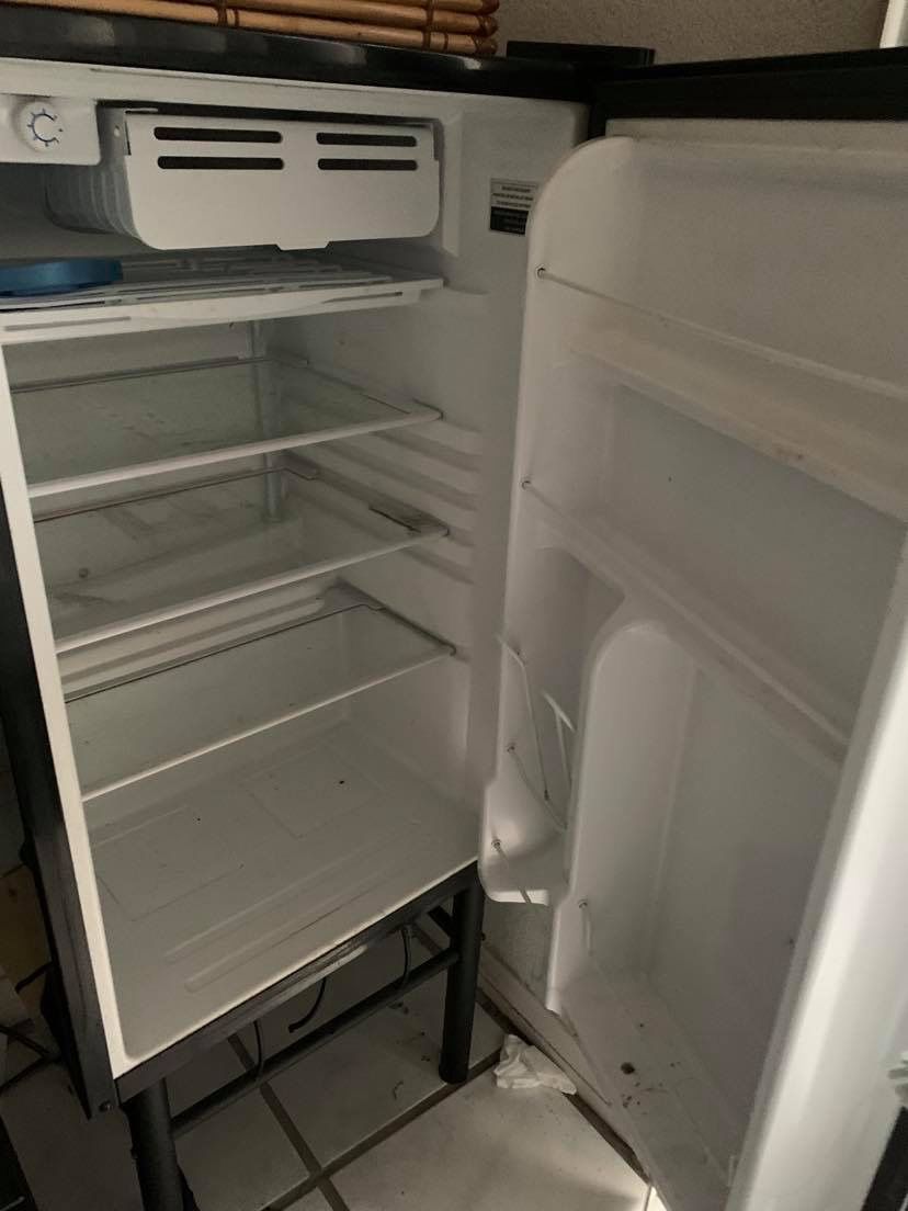 Small fridge, baby bathtub and fisher price electric swing