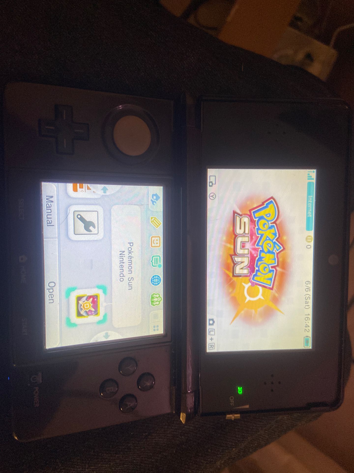 Nintendo 3ds with pokemon sun downloaded.