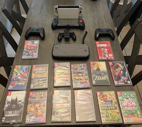 Nintendo Switch OLED with games and accessories