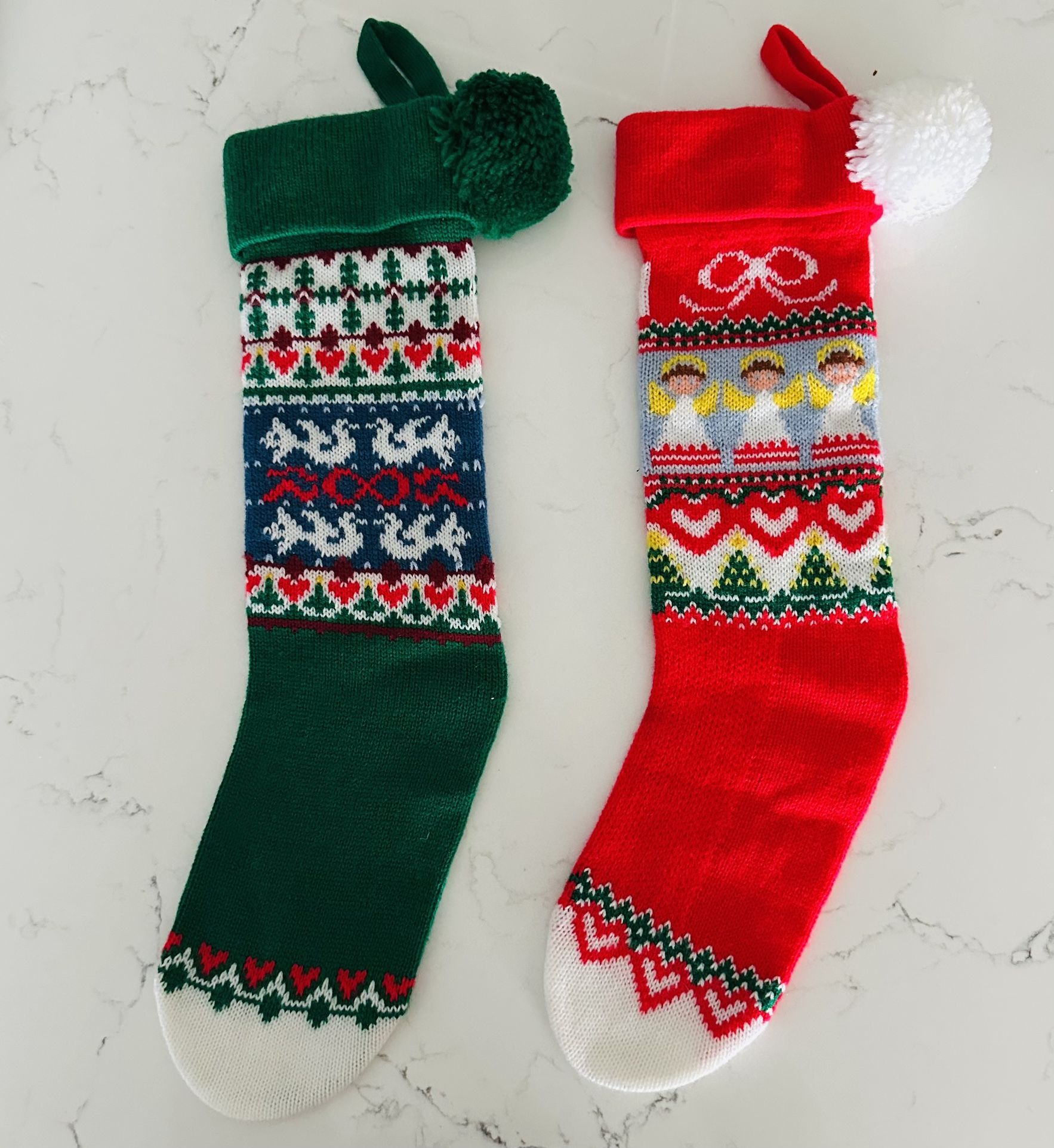 set of two Vintage hallmark 1982 & 83 Christmas knit stockings with Pom poms 19” long. great condition. made in Taiwan They look like new