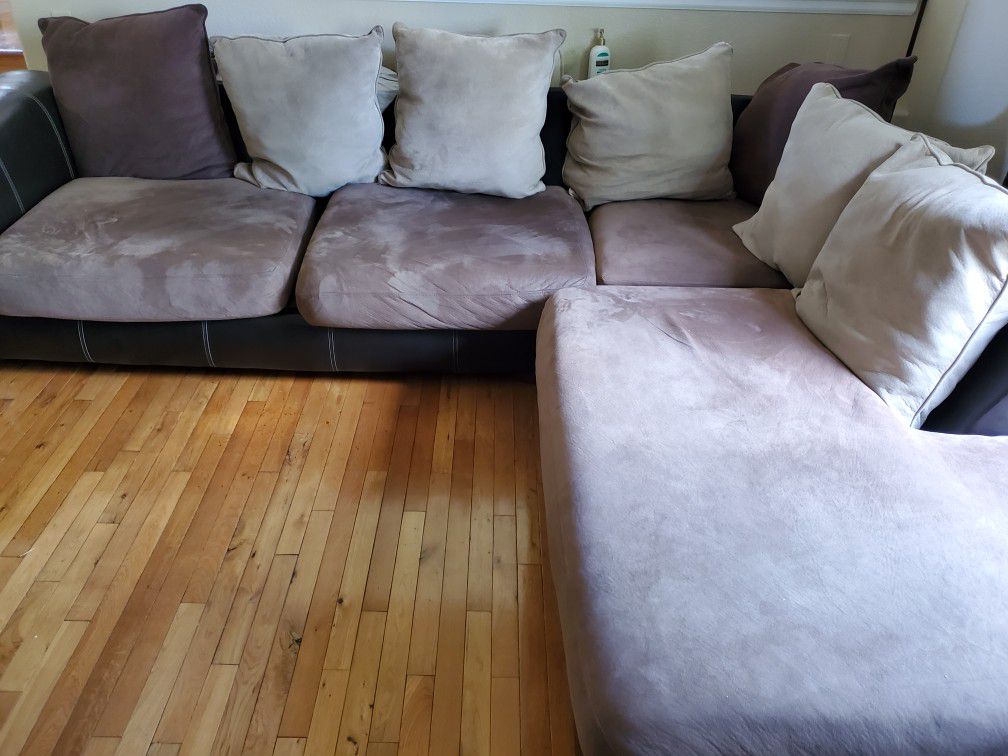 Free sectional couch. 10 foot by 8 foot. Must be gone tonight.