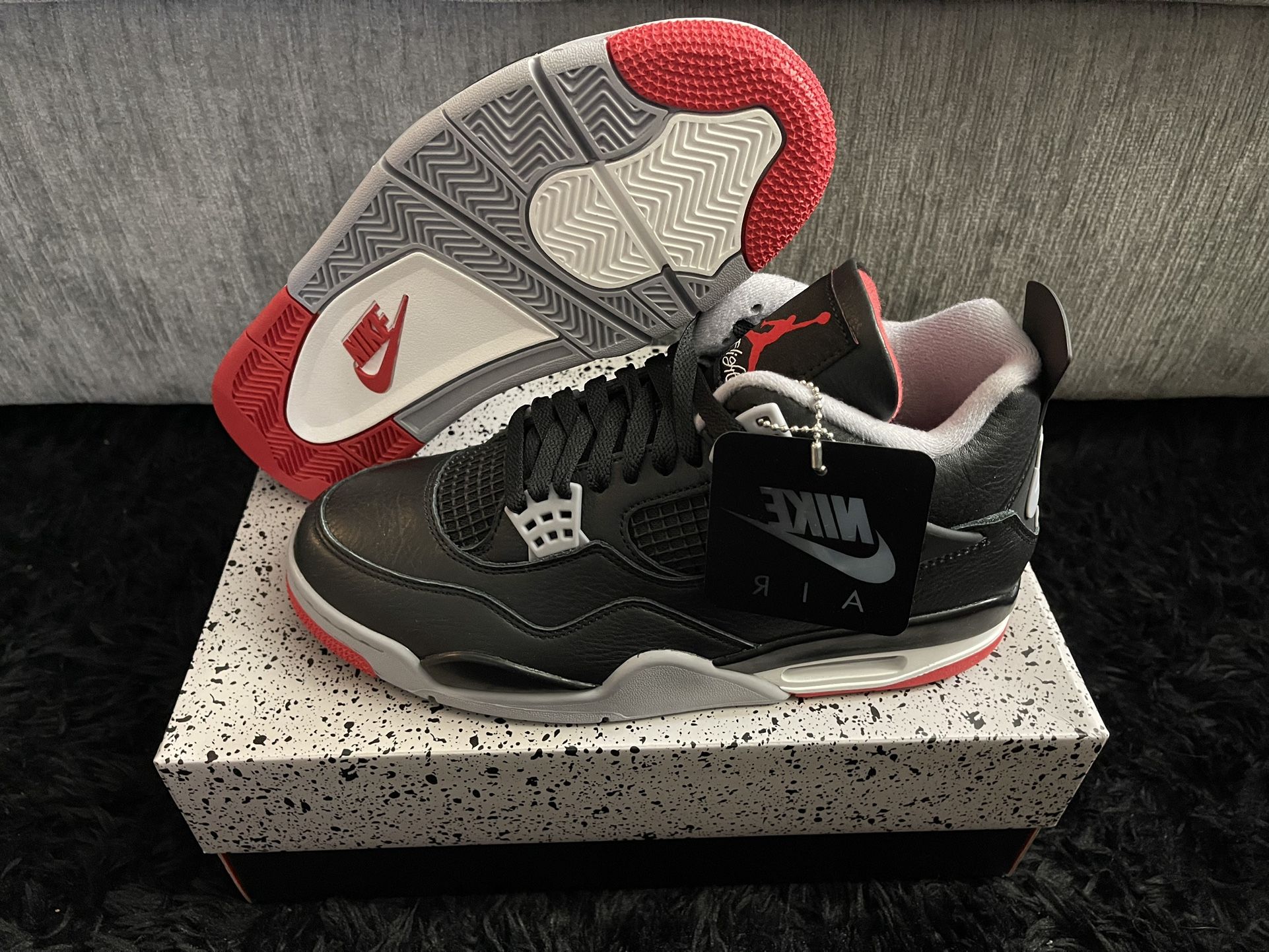 Air Jordan Bred 4 Reimagined. Multiple Sizes