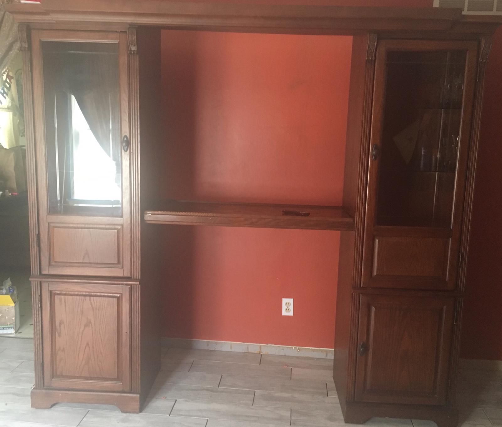 Tv stand for sale. It is in good condition but one door is missing the knob. We do not deliver it would have to be picked up.