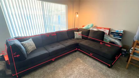 Sectional couch with pillows