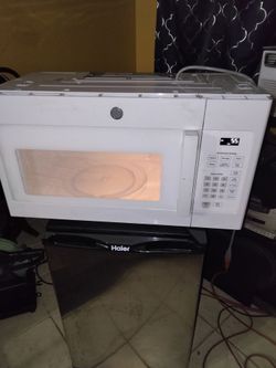 140 or make a close offer GE over the range microwave nice