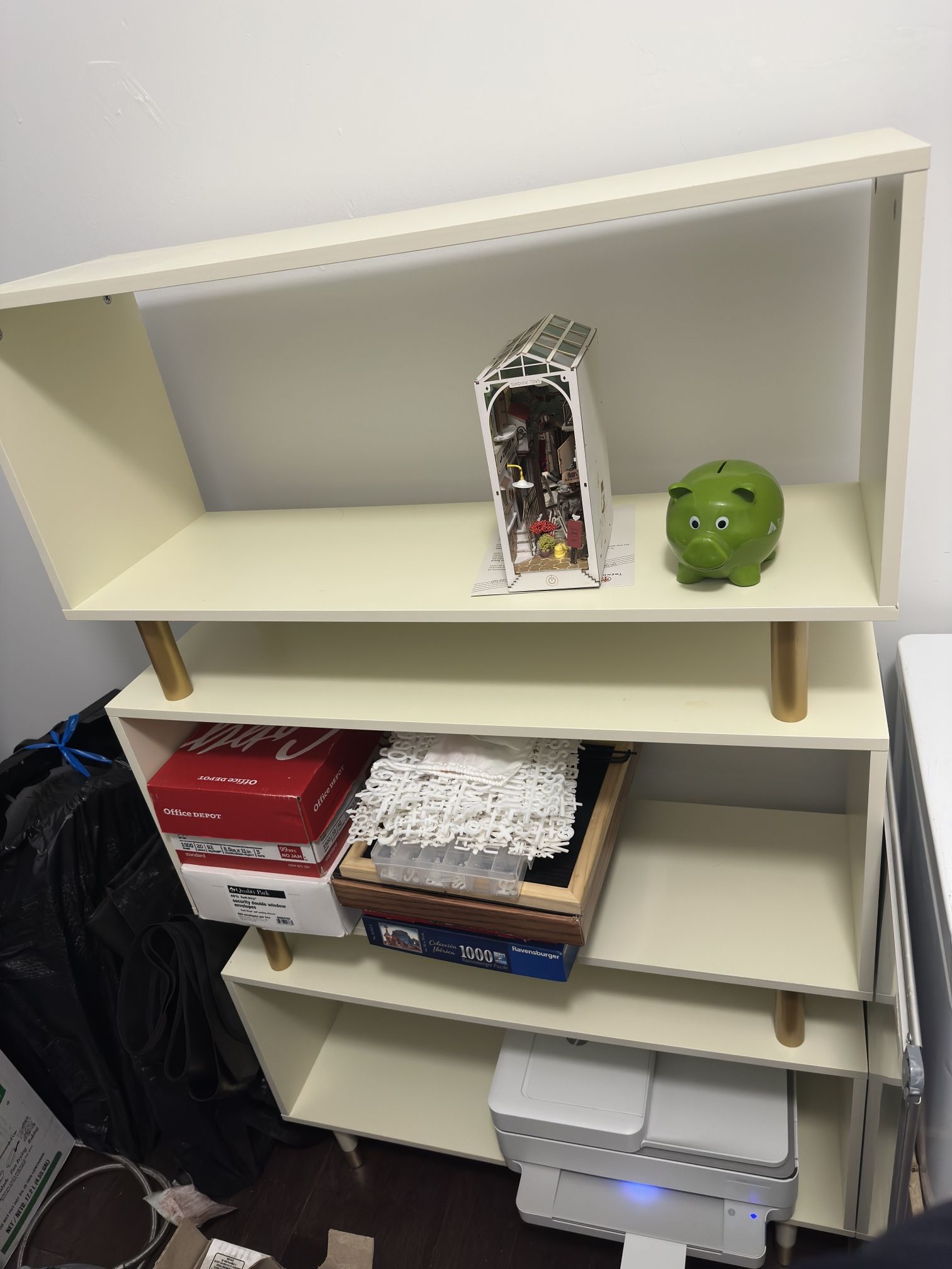 White And Gold Tiered Bookshelf