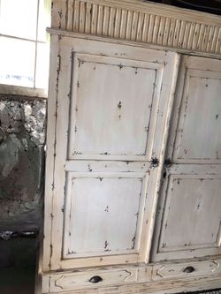 Beautiful distressed armoire 300. Firm