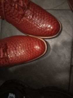 One pair of brown colored Stacy's Adams and one color of burgundy Stacy Adams size 15 14 and one pair of reeboks size 9