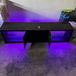 Entertainment center w/ LEDs, remote, power strip, 2 USB