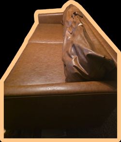 Faux leather love seat couch