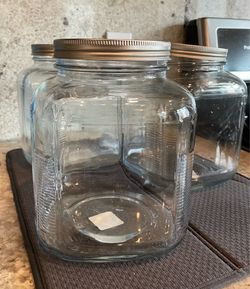 Three Glass Storage Jars